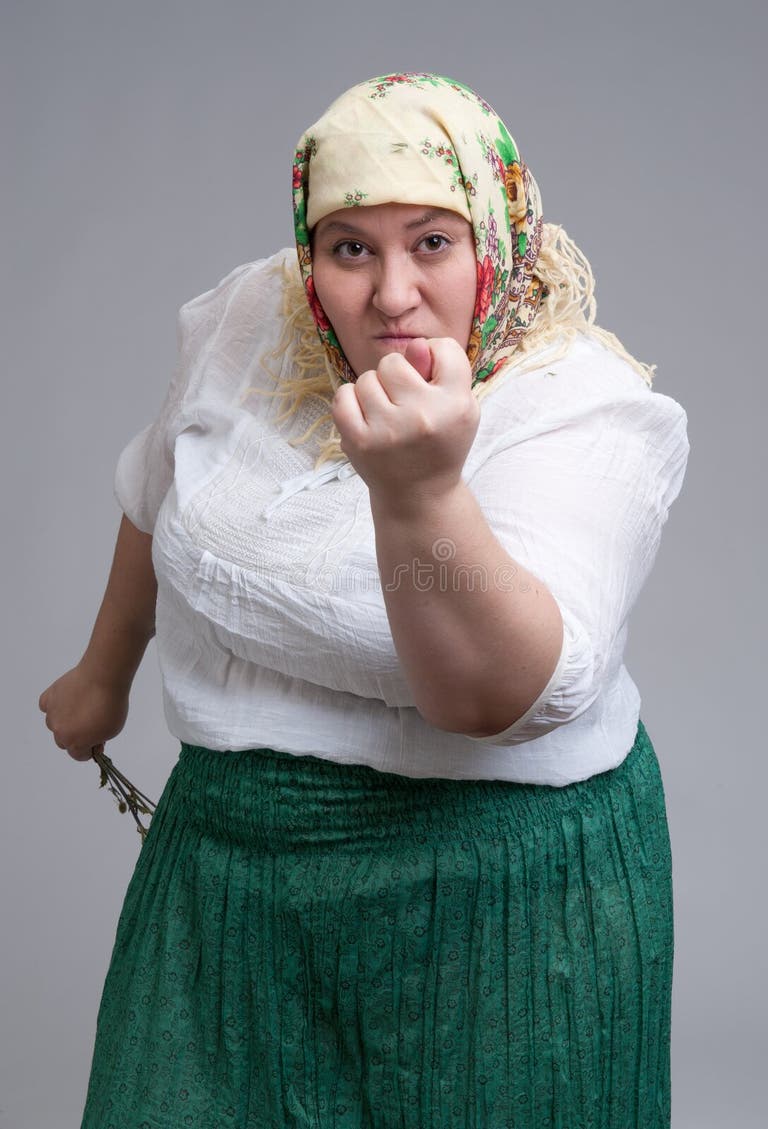 angry-russian-woman-isolated-over-gray-background-47041965-1916301405.jpg